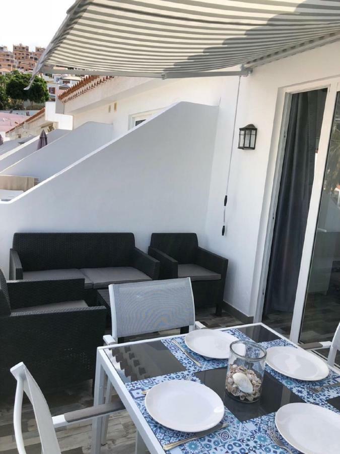 Village Island Heights أذيخي المظهر الخارجي الصورة